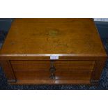 An oak wellington 2 drawer canteen chest containing a selection of silver plated flatware