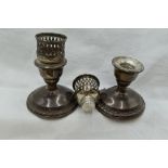 A pair of American silver candle sticks of squat form by La Pierre of New York having screw in