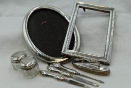 A selection of HM silver including two photograph frames of plain form, both AF and a selection of