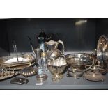 A selection of silver plated ware including tureens, table basket, toast rack, coffee pot etc