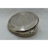 A white metal mirrored compact stamped Sterling having Aztec style engraved decoration to lid and