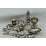 A selection of HM silver including two butter knives, egg cup, pepperette, mustard, table spoon,