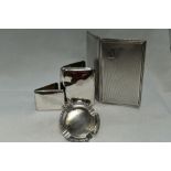 A selection of HM silver smoking related items including small ash tray, a large cigarette case