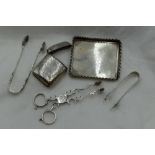 A selection of HM silver and white metal including scissor sugar nips of traditional form bearing