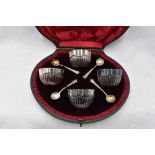 A cased set of four Victorian silver salts of bowl form having gadrooned decoration, London 1896/