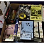 A large box of Elvis VHS videos, some rare and interesting titles