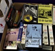 A large box of Elvis VHS videos, some rare and interesting titles