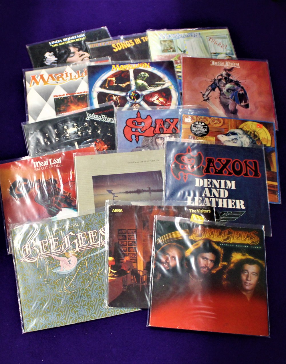 A lot of 15 albums - rock , pop , metal and more - great shop or online stock or just a nice way