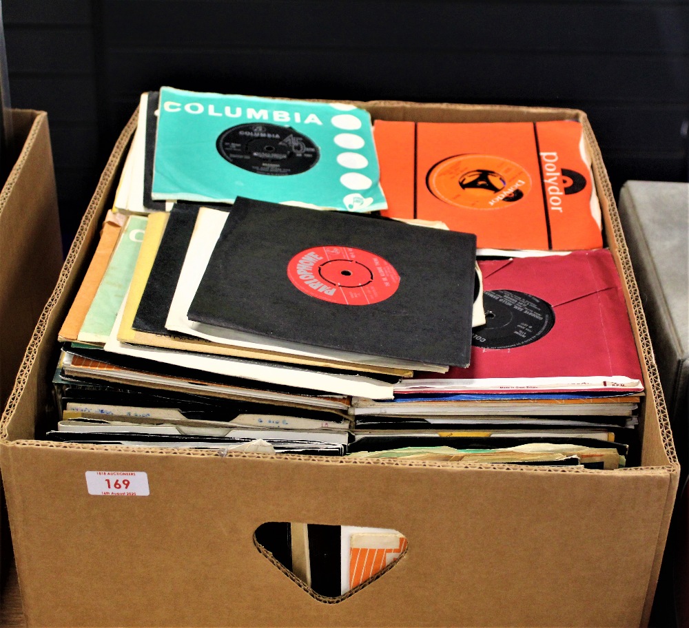 A large box of 7' singles , lots in company bags and the bulk being from the 60's and 70's