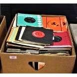 A large box of 7' singles , lots in company bags and the bulk being from the 60's and 70's