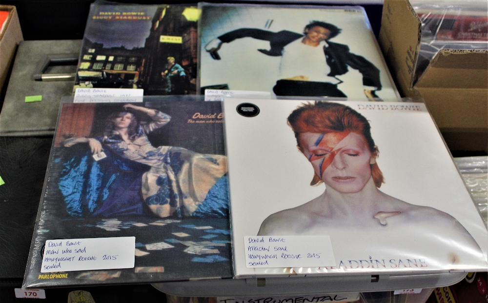 A lot of 4 David Bowie - sealed heavyweight reissues of Aladdin Sane and Man Who Sold the World