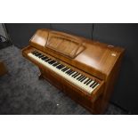 A mid 20th century walnut cased piano by Eavestaff, 'Pianette Mini Piano' six and a half octave
