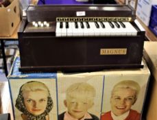 A Magnus Electric Chord Organ - nice sound from this vintage boxed item