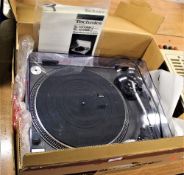 A technics SL 1200 MK 2 turntable - favoured by Dj's and barely used and boxed - with manuals -