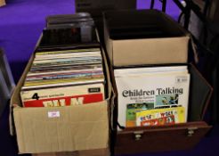 A lot of 4 boxes of vinyl albums - from children's album to jazz . Pop and much more - call our