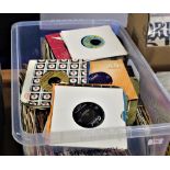 A large box of seven inch singles - various genres on offer here
