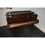 An early 20th Century baby grand piano, 85 key , in mahogany case on square tapered legs, signed