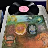 A copy of ' in the wake of poseidon ' by King Crimson - has condition issues - vg minus but an early