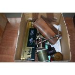 A box of assorted fishing tackle, including vintage brass fly reel and leather pocket fly case
