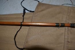 A split cane fly rod marked D. Pollard with sleeve