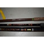 Three large fishing rods including two Chevron