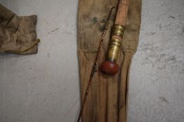 An 11ft Gow of Dundee three piece fly rod with spare tip and sleeve