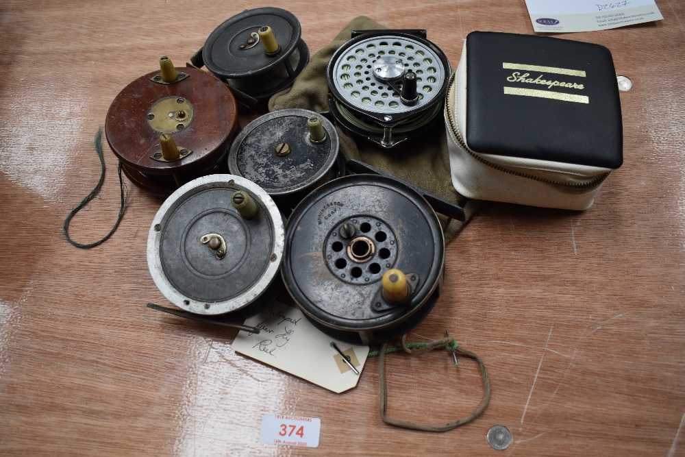 An assortment of seven fly reels