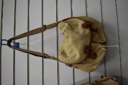 A canvas and leather trim fishing bag