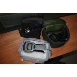 Two Daiwa spinning reels in cases and set of digital fish scales by Rapala