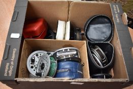 An assortment of fly reels, including J W Young, Shakespeare and Olympic 420