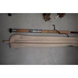 A large 14ft three peice salmon rod unmarked with sleeve