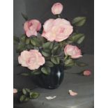 An oil painting, G L Reekie, Pink Roses, signed and dated 1969, attributed verso, framed, 63 x 44cm