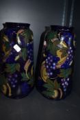 A pair of Royal Stanley Ware vase having the Jacobean design 35cm high