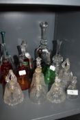 A collection of glass bells, including crystal and cut glass, some colourful ones too with gilt