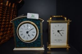 Two clocks of small size a Royal Doulton mantle clock and similar brass cased Wm, Widdop having