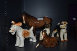 A selection of figurines and animal studies including Goebel, Beswick and Sylvac