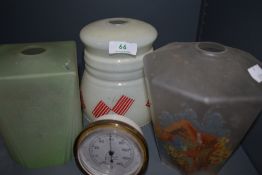Three vintage deco styled glass lamp shades and a Rototherm thermometer.