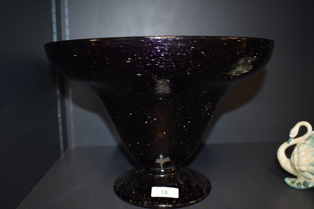 A large bubble glass table centre having bell design in Amythyst.