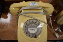 A vintage cream telephone, has been converted to modern wiring, however, it is untested.