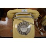 A vintage cream telephone, has been converted to modern wiring, however, it is untested.