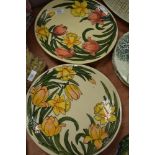 A pair of deco styled chargers, Bearing the name Charlotte Rhead by Crown Ducal having hand
