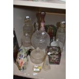 A collection of glass, amongst which are two cut glass decanters and more.