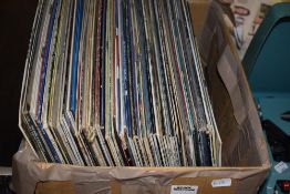 A box of vinyl LP records,mainly easy listening with some jazz and big band.