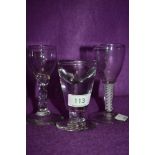 A selection of antique glass including one Victorian penny lick at 10cm, a wine glass with opaque