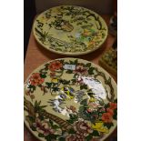 Two deco styled chargers,bearing the name Charlotte Rhead by Crown Ducal having hand painted designs