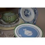 A selection of vintage plates, including two blue and white platters, Wedgwood,collectors plates and