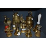 A selection of vintage brass bells, including cow bells and souvenir types. One having red enamel