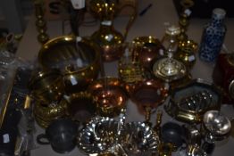 A large lot of brass, copper and plated ware, amongst which are planters, toast racks, egg cup,