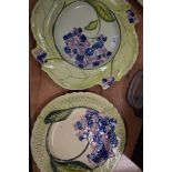 Three large platters, each bearing the name Carlton Ware to underside, with hand painted floral
