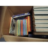 A box of mainly childrens volumes including Ladybird, Arthur Ransome etc